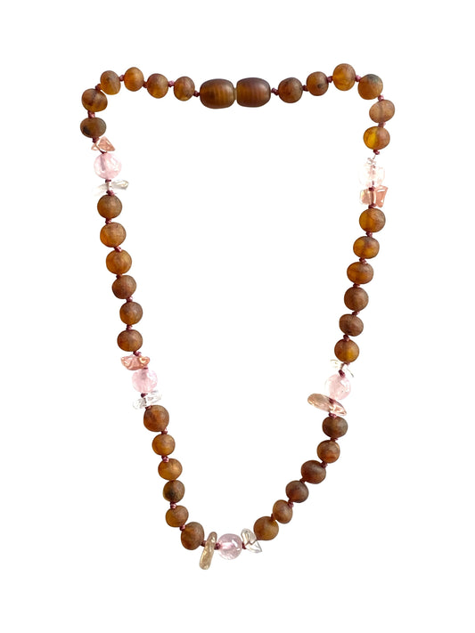 Natural Relief: We combined the natural healing of Baltic Amber, which helps with teething symptoms like Irritability, fussiness, drooling, pain inflammation while supporting their developing immune systems; with the following Gemstones: Rose Quartz, Agate and White Quartz for an overall happier and more relaxed baby. 