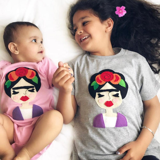 Frida Kahlo is such an inspiration! WE love her art and revolutionary spirit.   Handmade and hand-stitched. For boys & girls.  Materials: Felt pieces cut and appliqued to the 100% cotton onesie. This cool unique tee is made to order and with 100% love!